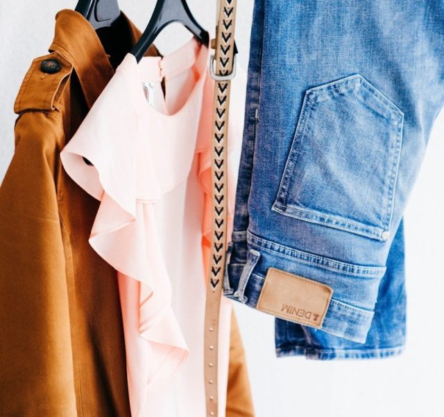 women's four assorted apparel hanged on clothes rack